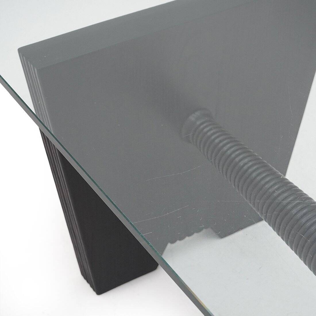 Coffee table with a glass top and black stained wood frame, 1930s.