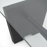 Coffee table with a glass top and black stained wood frame, 1930s.