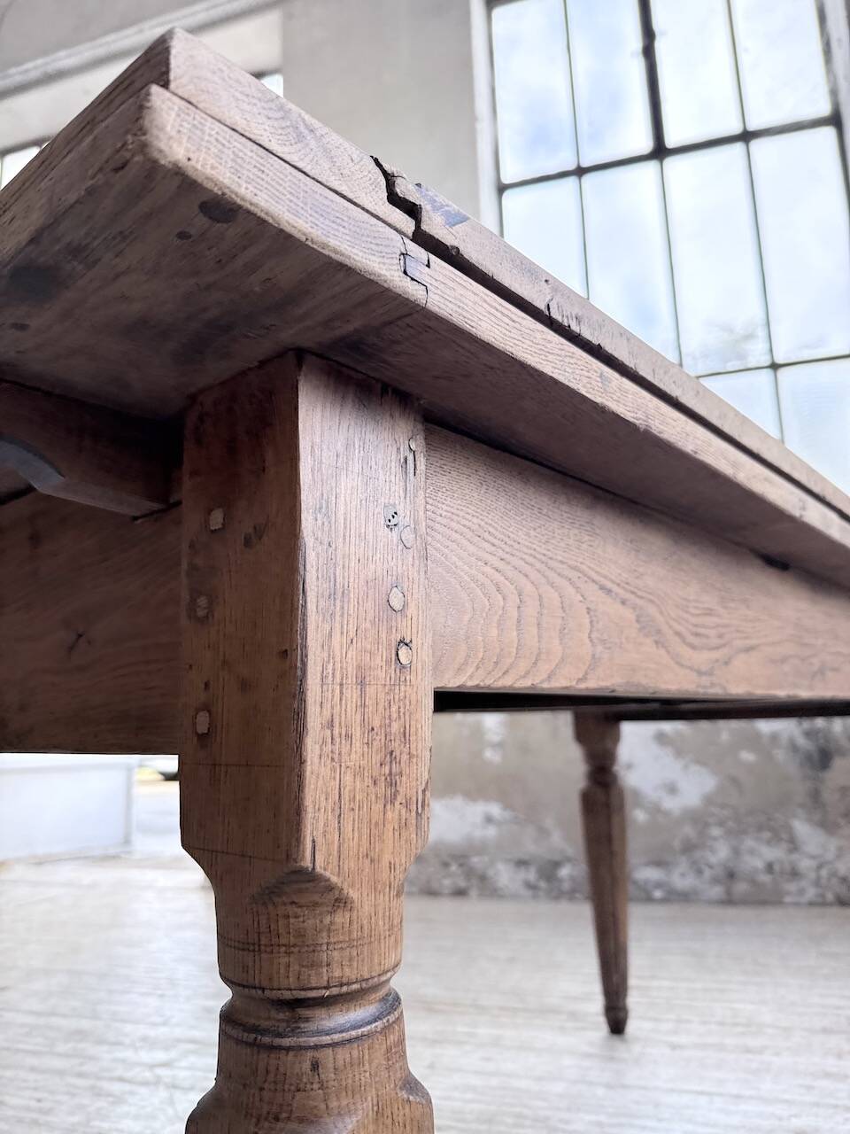 Solid oak farmhouse table with integrated extensions 1950