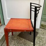 Chair with wooden seat and rare steel back