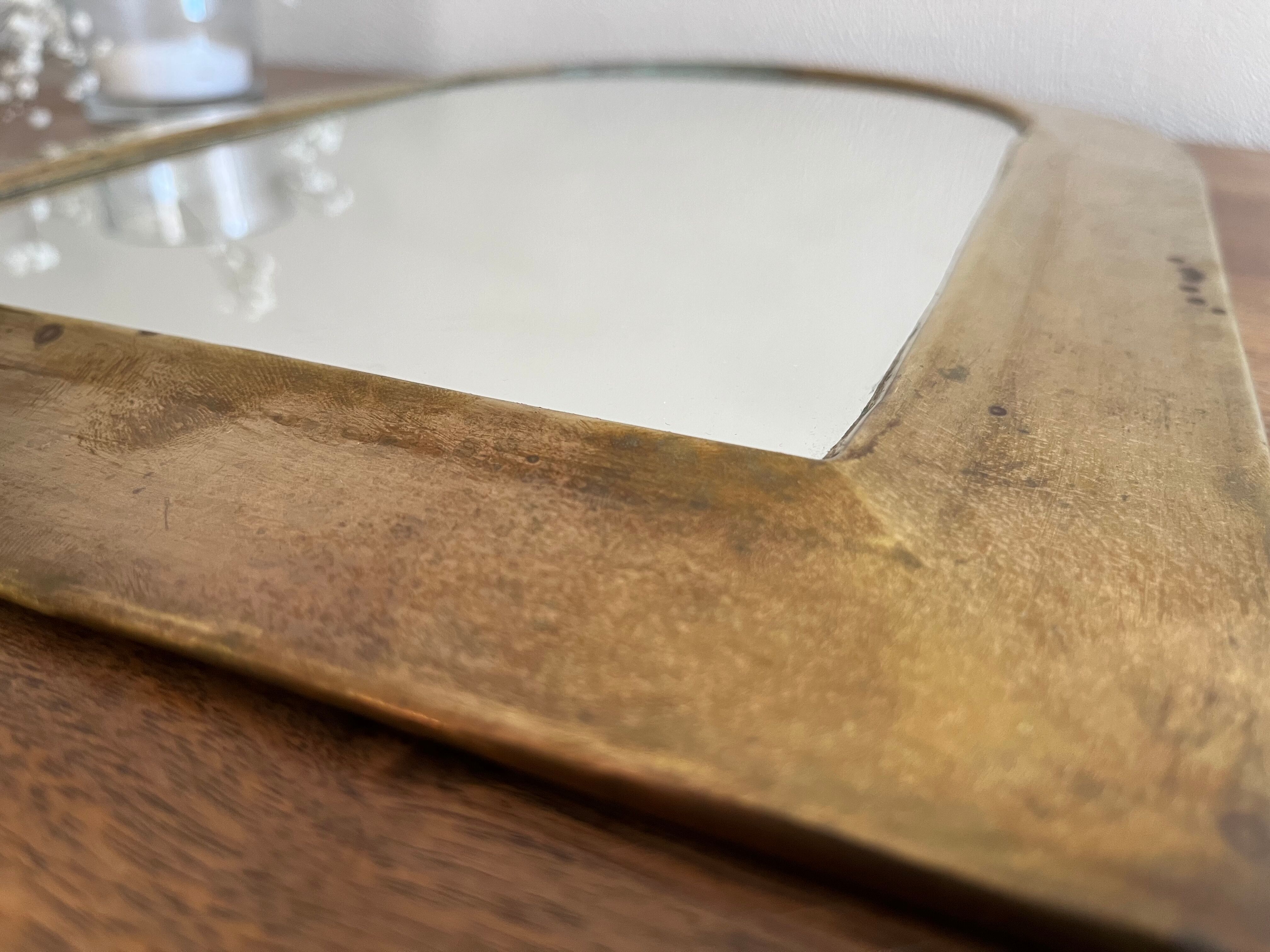 Brass half-moon mirror