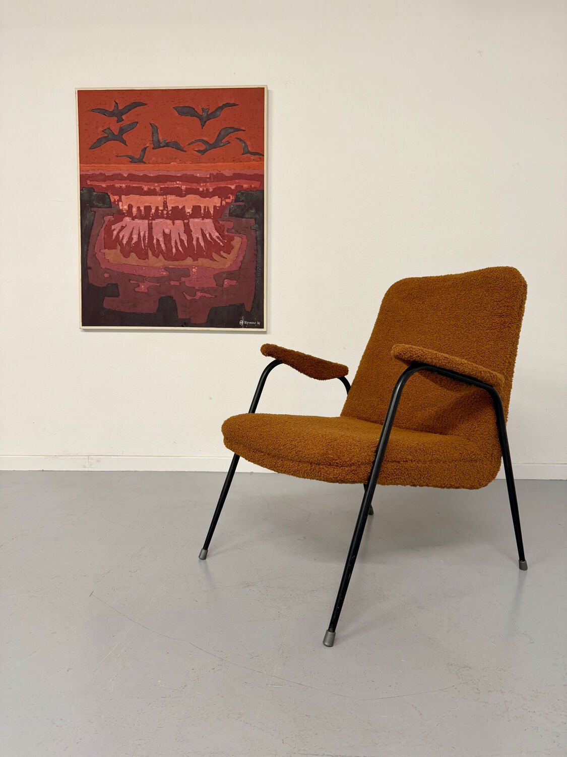 Vintage orange boucle armchair, French design from the 1950s.