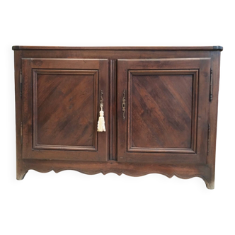 Antique buffet with two doors and a chest from the 19th century.