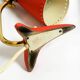 Pair of red Mid Century Modern Diabolo crow's foot table lamps from Cosack