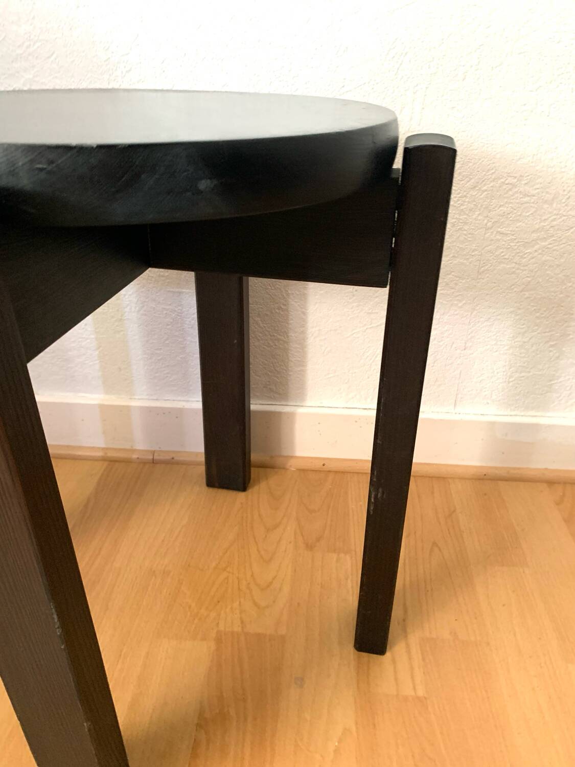 Black lacquered wooden stool