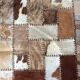 Patchwork carpet in cowhide 164x105cm from the 70s