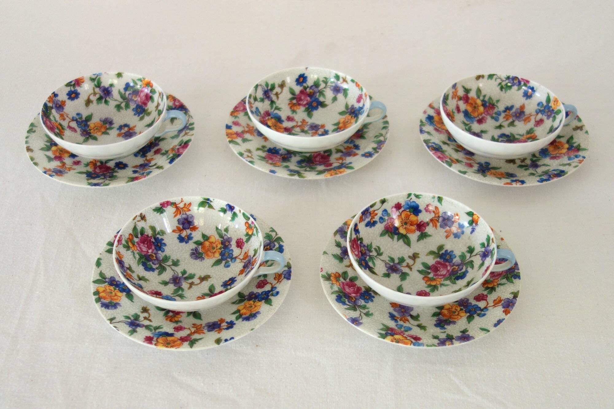 5 vintage flower pattern cups and saucers