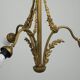 Antique pendant lamp with gold-coloured and ornate details and 3 fittings