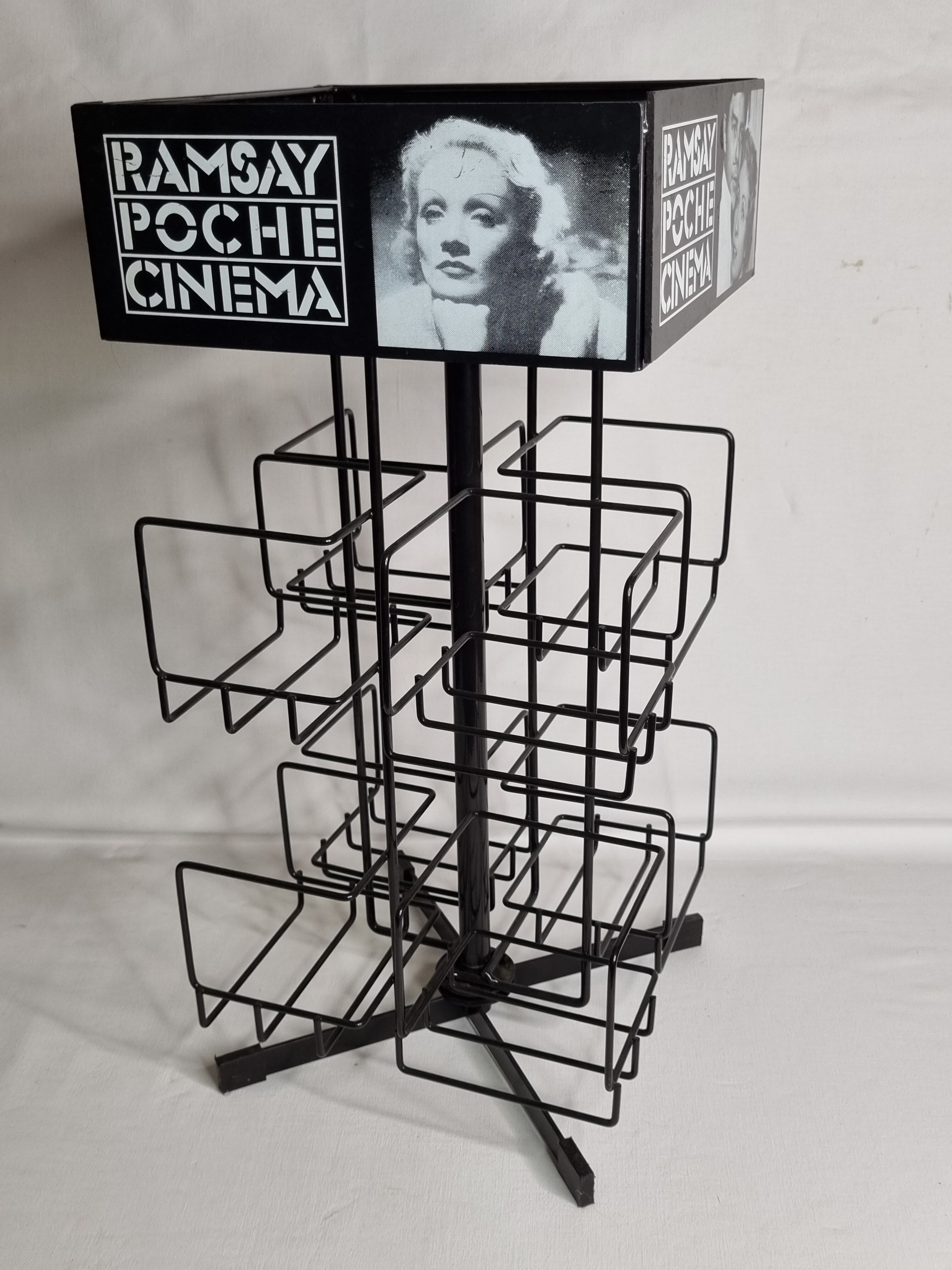 Vintage rotating bookcase for paperbacks in black lacquered metal, 58 cm