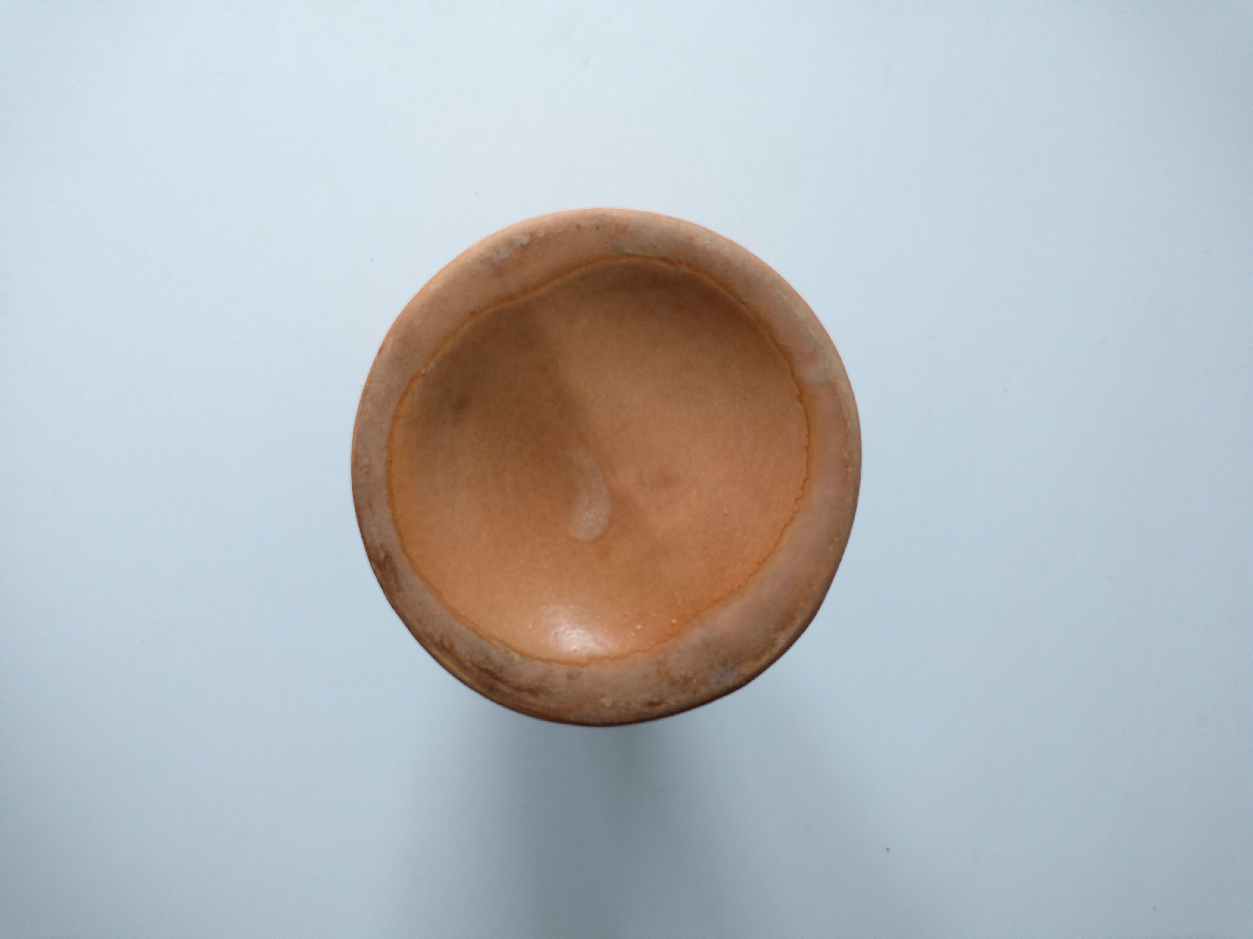 Handmade terracotta vase in terra cotta color