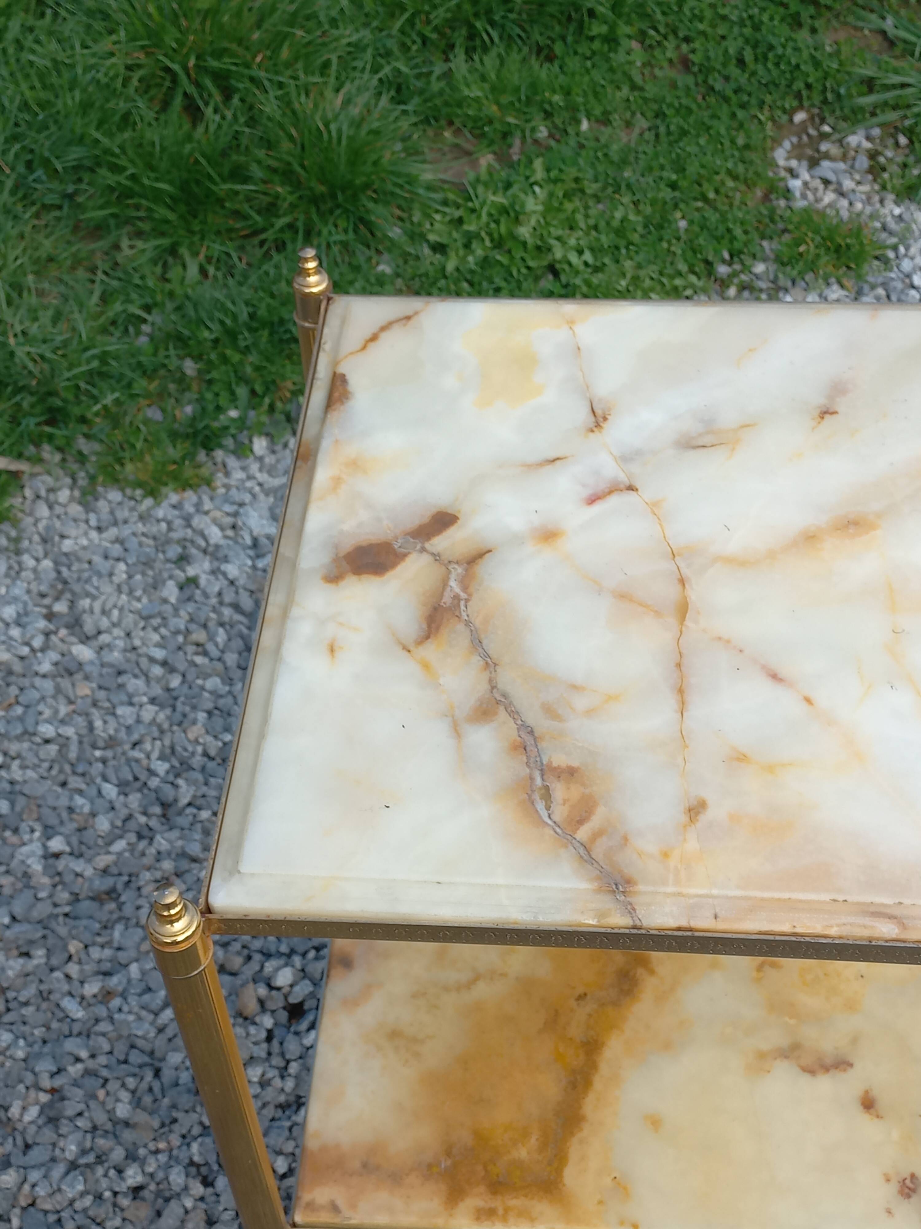 Pair of neoclassical side tables in bronze, brass, marble, and o.
