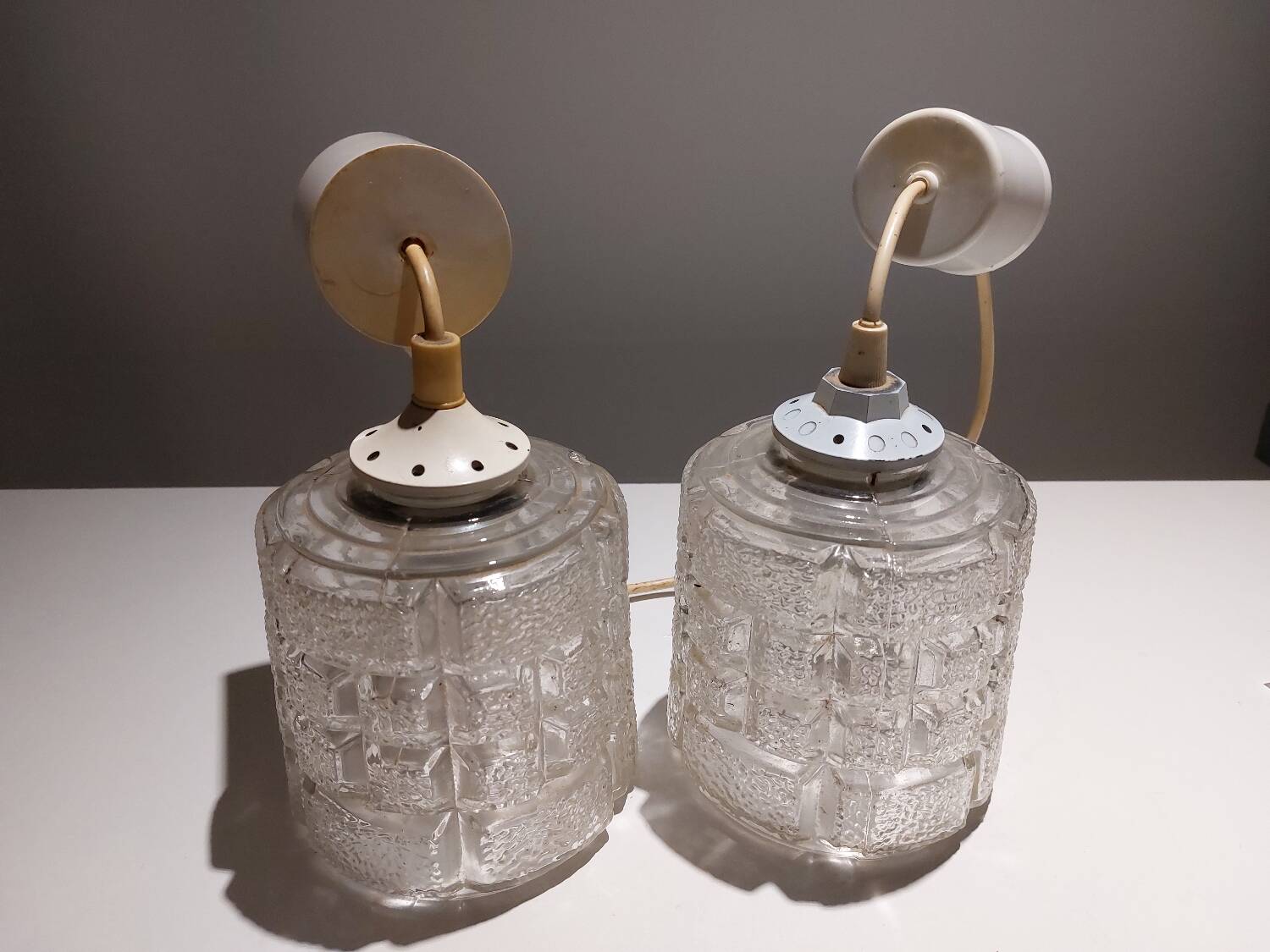 Pair of art deco textured glass chandeliers