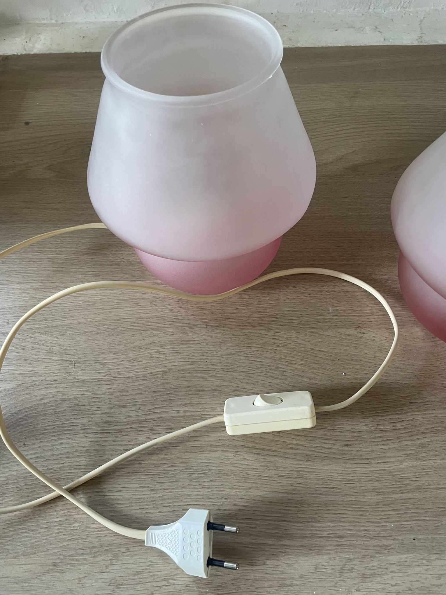 Pair of frosted pink glass mushroom lamps