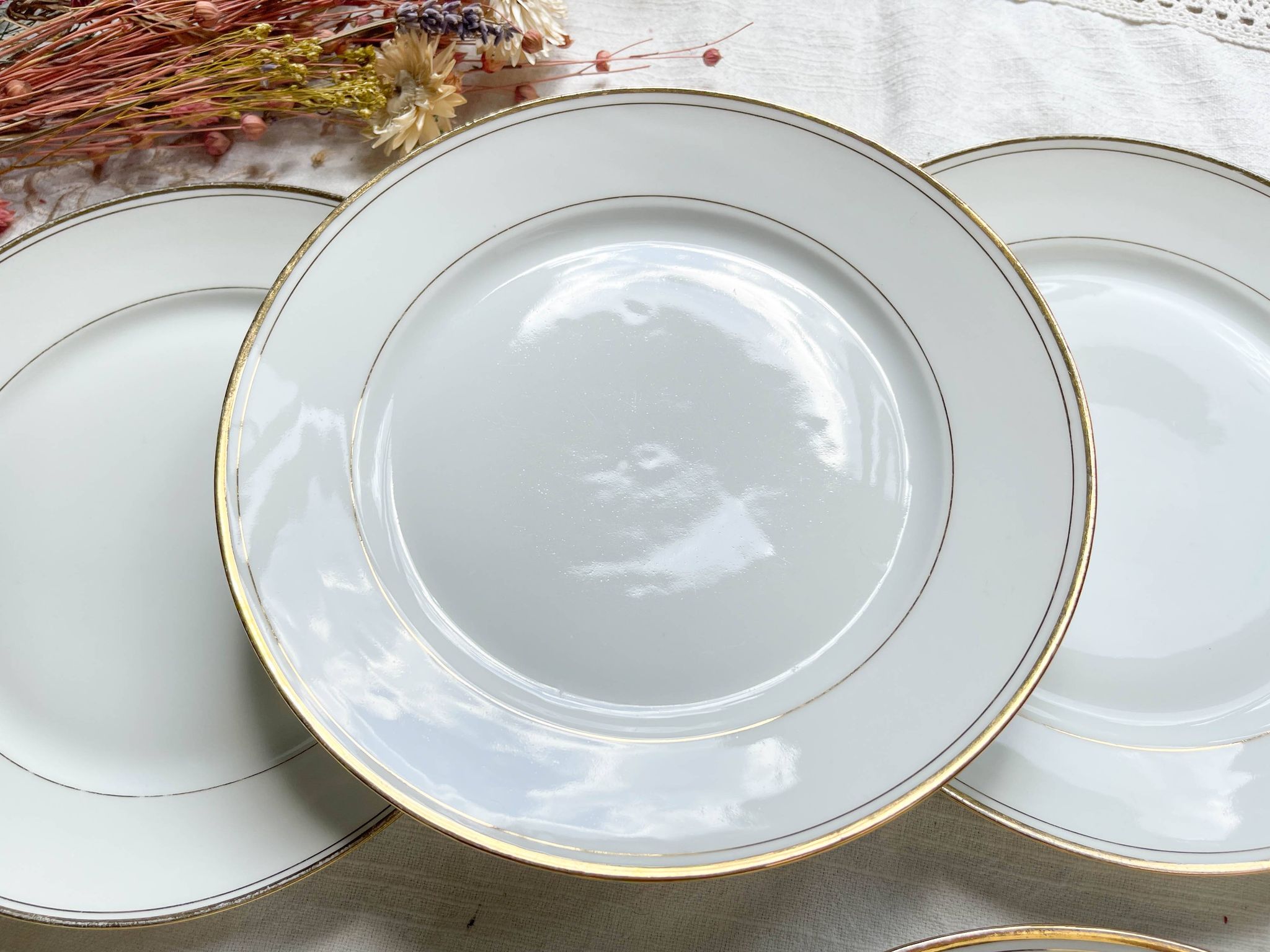 6 Small vintage French plates in golden white Limoges porcelain