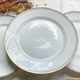 6 Small vintage French plates in golden white Limoges porcelain