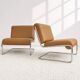 Vintage cantilever armchair. Brown faux leather upholstery. 60s