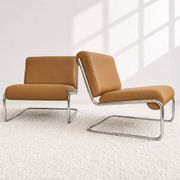 Vintage cantilever armchair. Brown faux leather upholstery. 60s