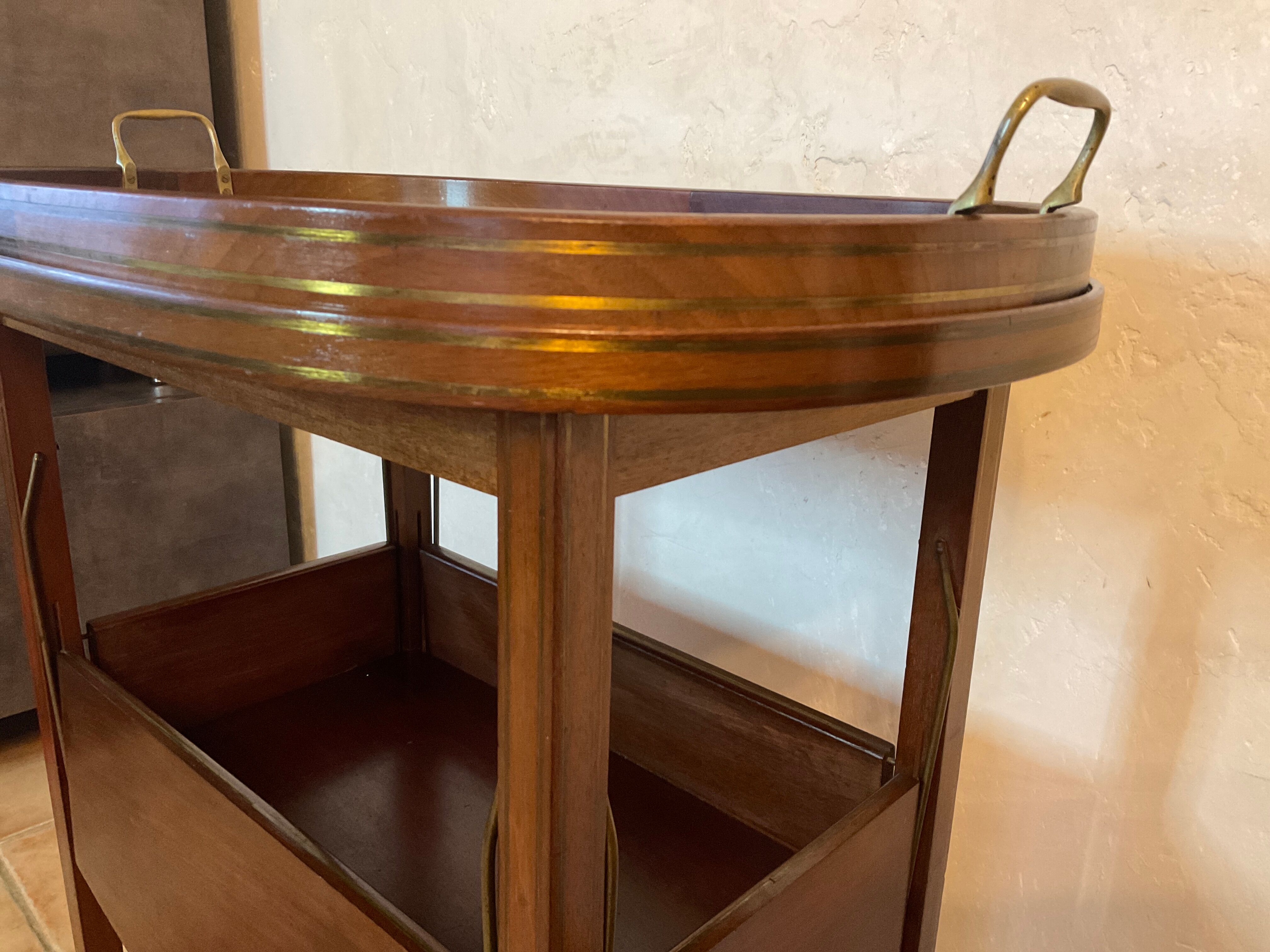 Tea table serving oval maid in mahogany brass marquetry