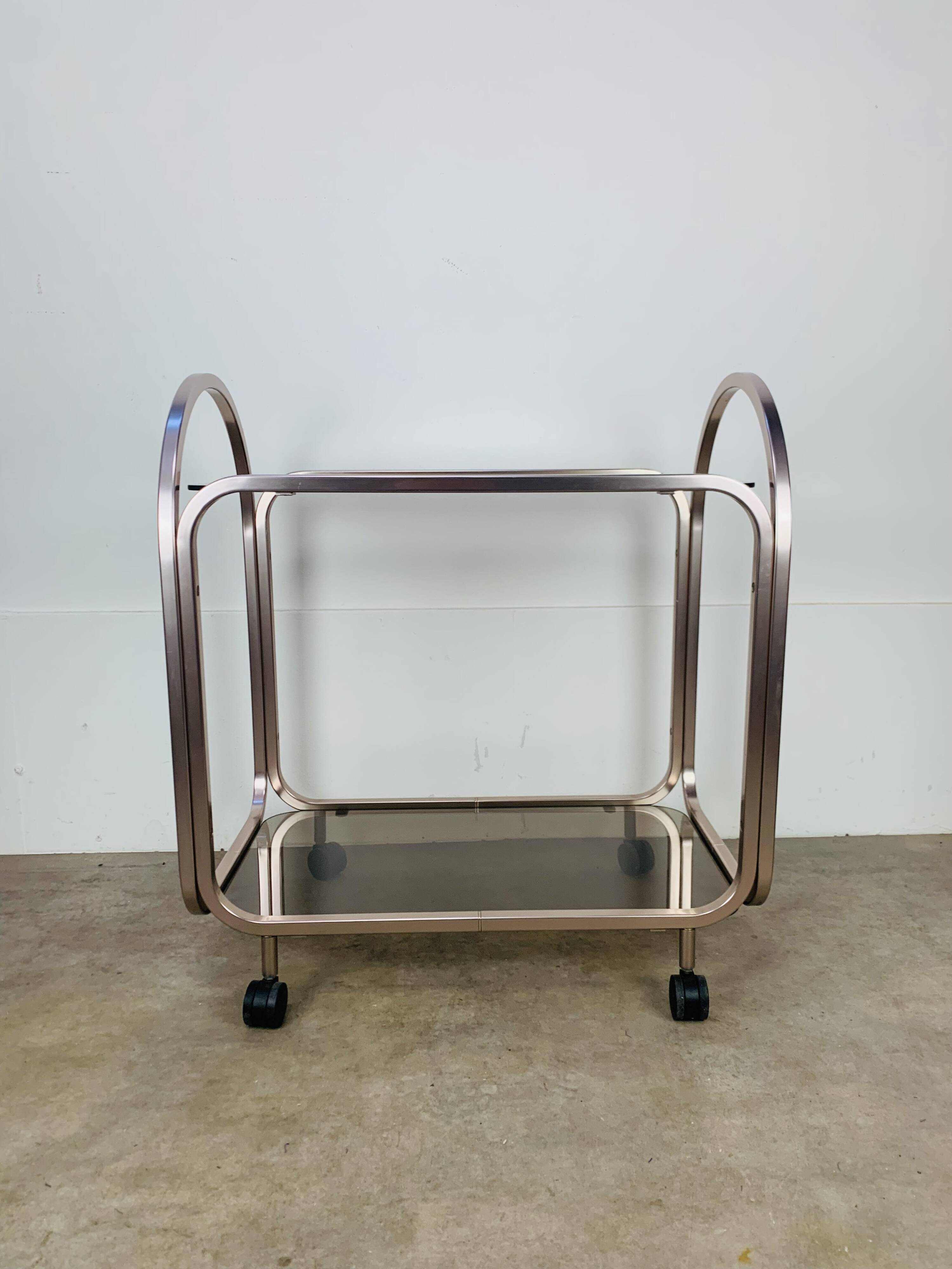 Kaymet dessert trolley in smoked glass and anodised aluminium, 1980s.