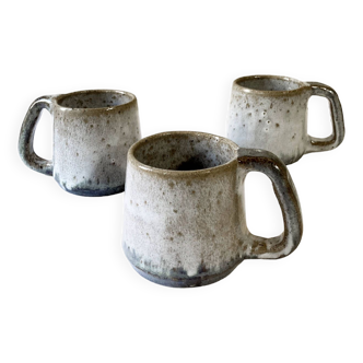 Trio of stoneware mugs