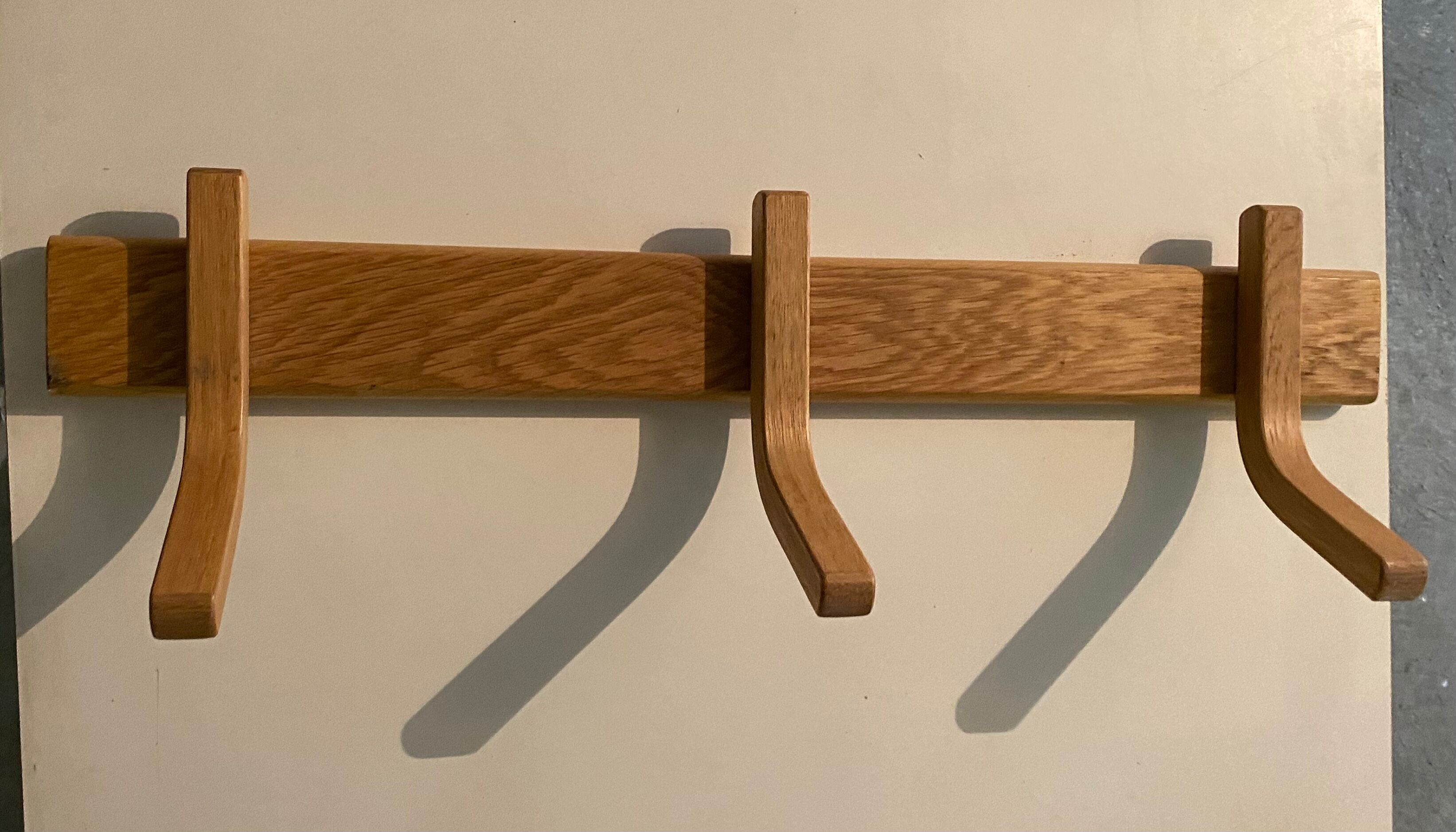 Wooden wall coat rack