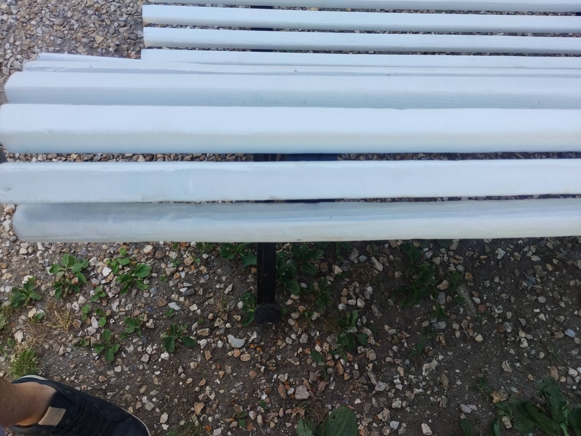 Antique garden bench with cast iron legs