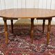 Round cherry wood table, 6 feet, Louis Philippe style with 2 extensions.