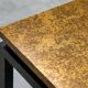 Modernist coffee table with a patinated gold top, 120x52.5x36 cm, mid-20th century.