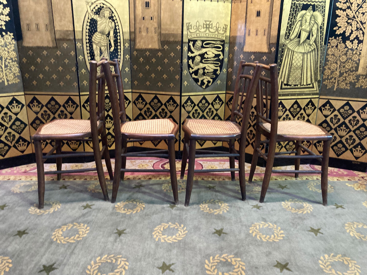 4 tanned bistro chairs