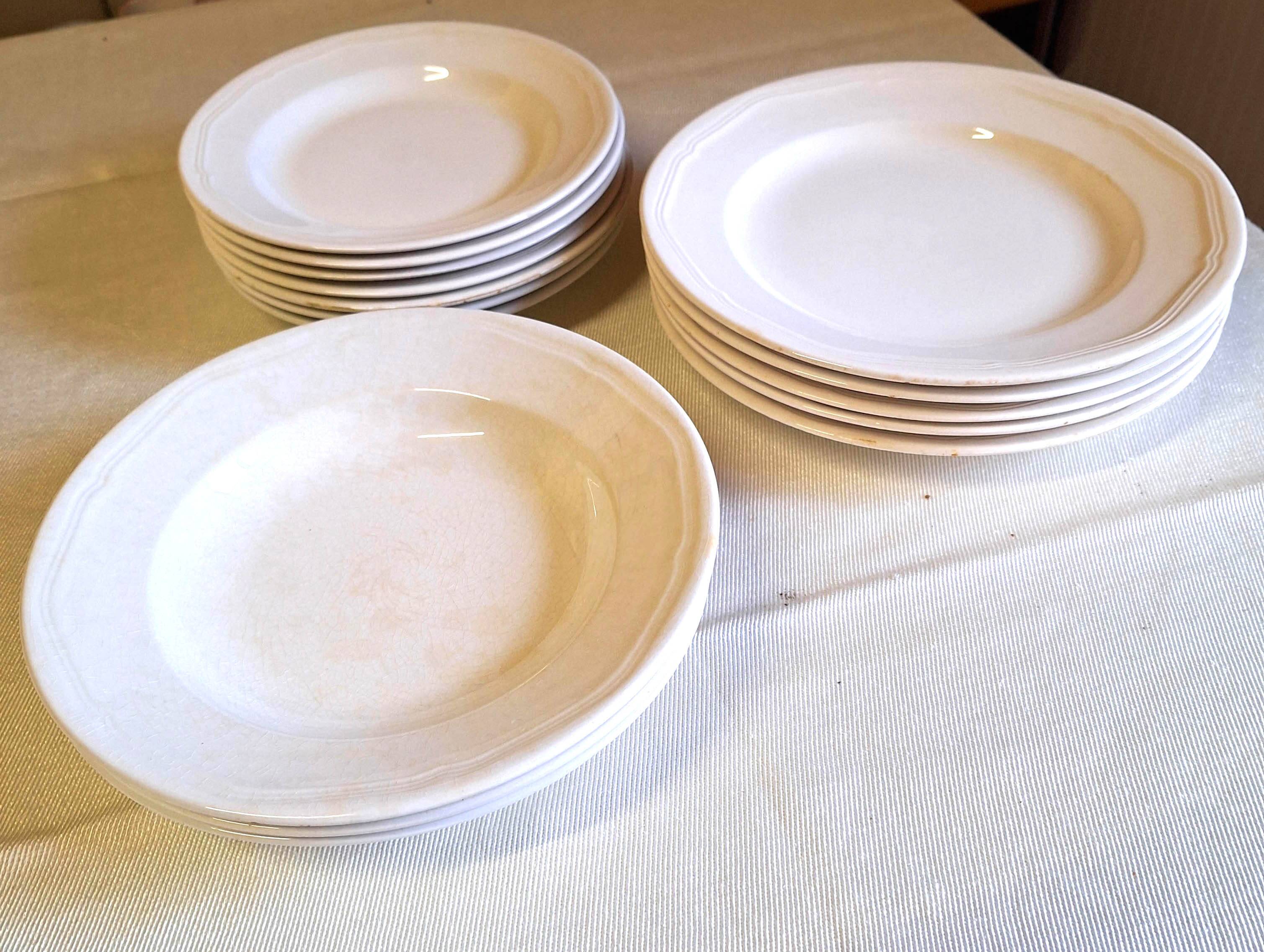 15 white earthenware plates