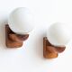 Pair of solid pine and opaline wall lights