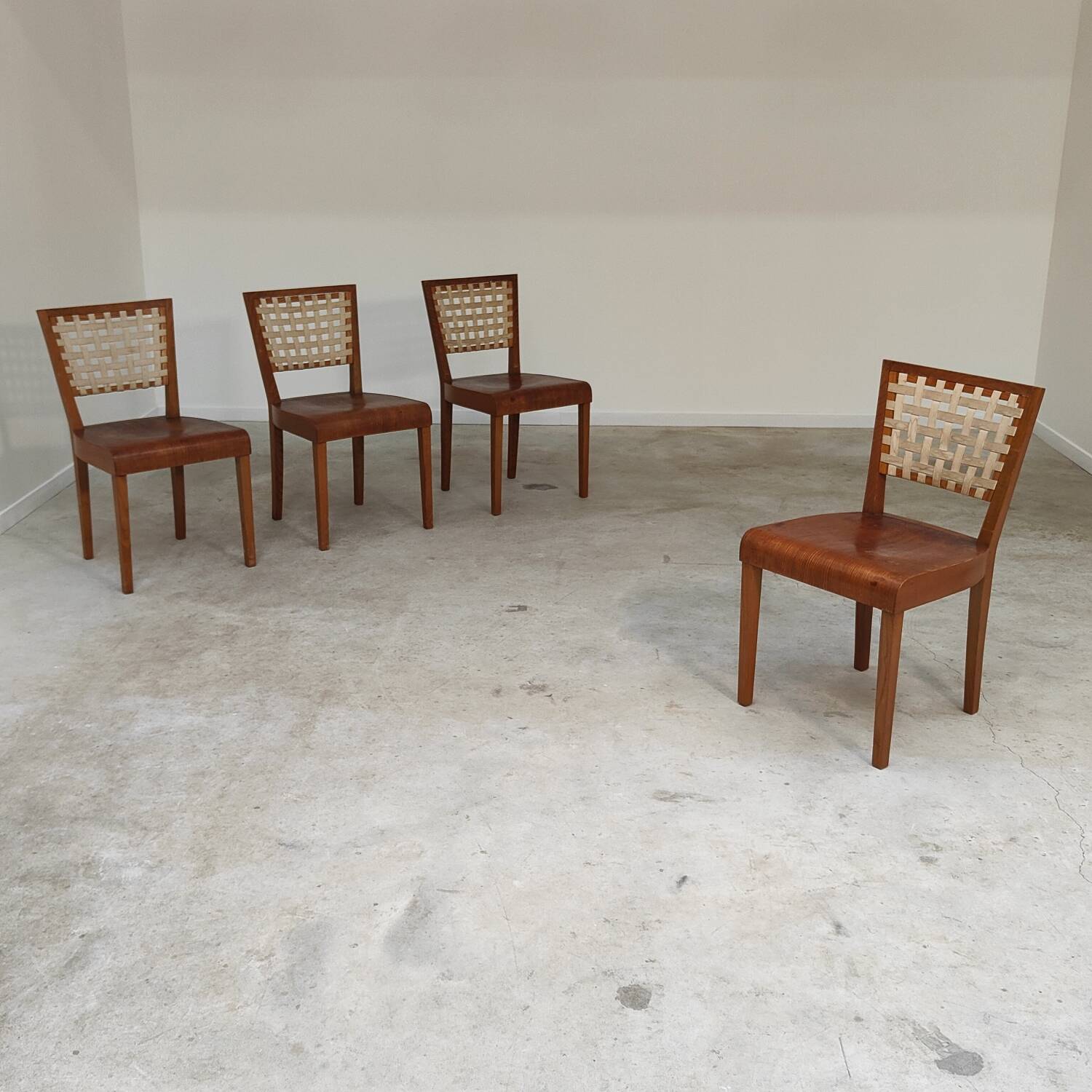 Series of 4 wood and strap chairs by Krasna Jizba Year 40
