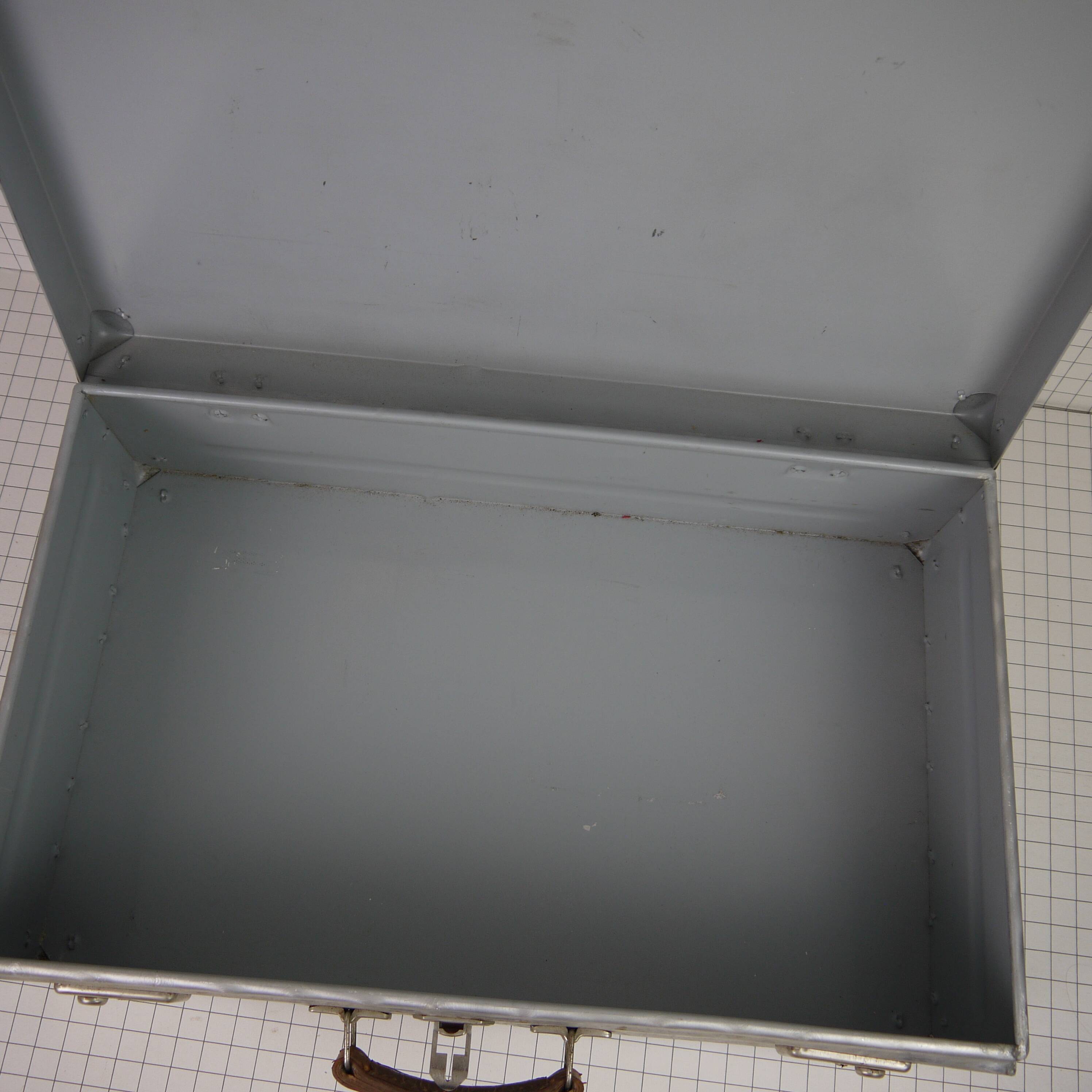 Metal case and leather handle