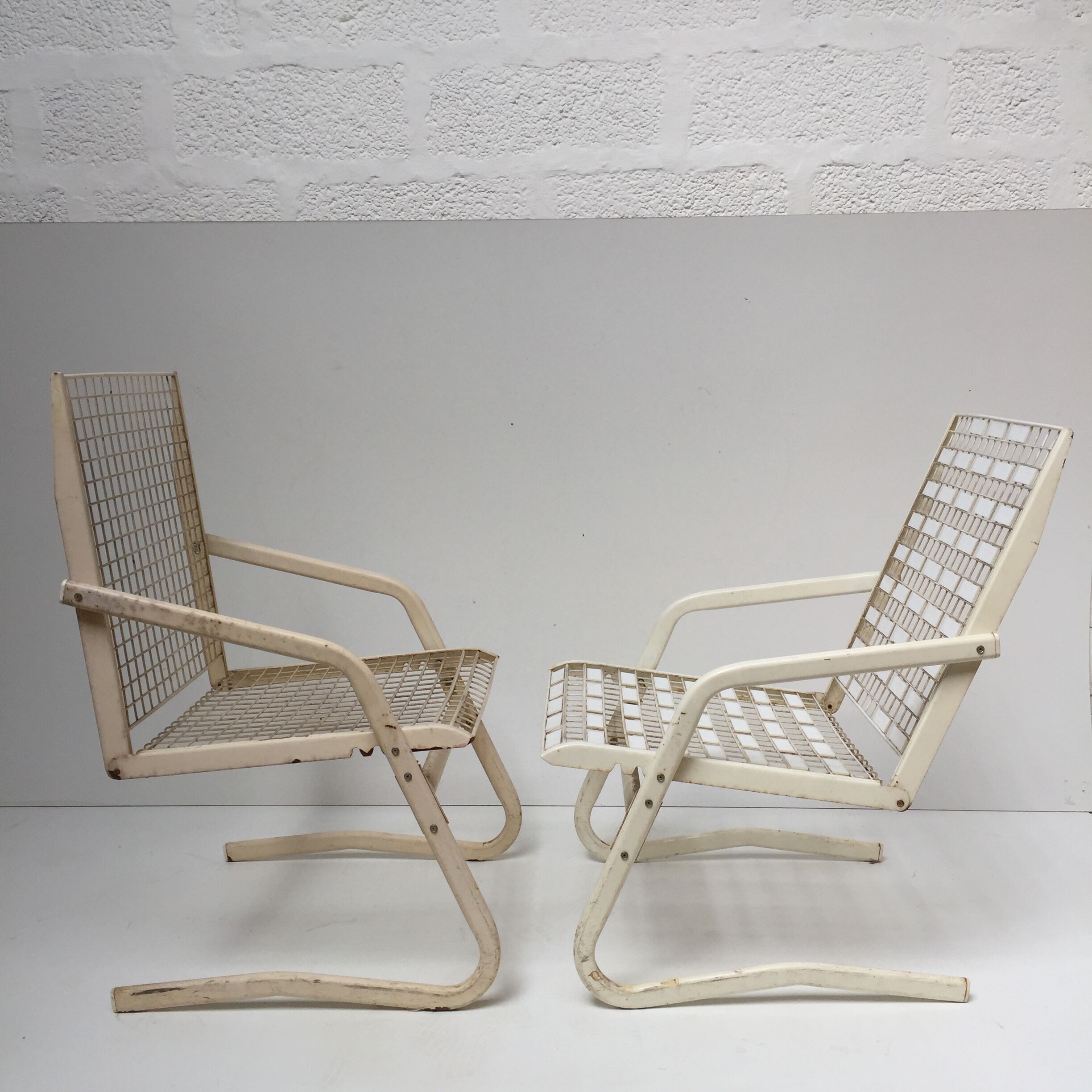 Pair of metal chairs