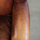 Comfortable cowhide wingback armchair in English style