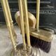 Brass fireplace accessory set with vintage stand