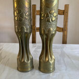 2 shell casing vases
