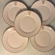 Service à thé en porcelaine (Limoges) 35 pieces monogrammè à liseré doré