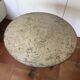 Round and antique metal side table
