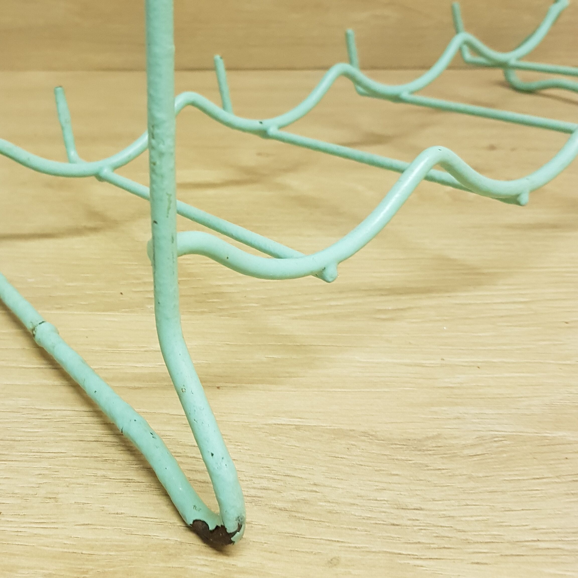 Metal aqua green bottle rack