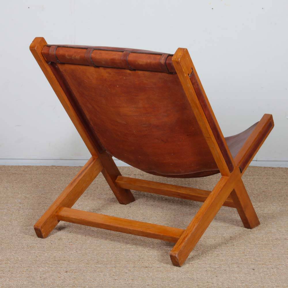 Pair of large wooden and leather armchairs from the 1980s