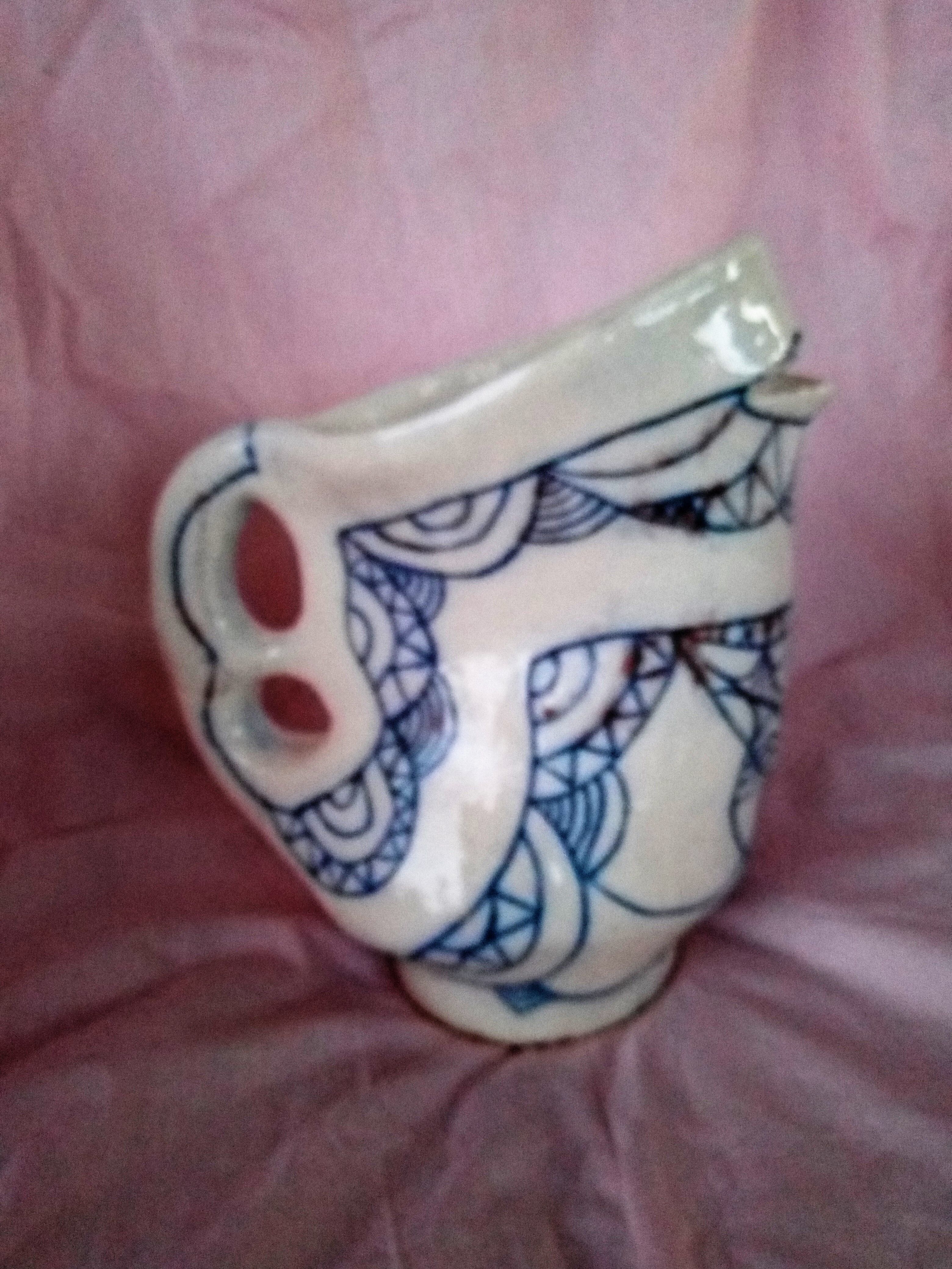 Zoomorphic pitcher in enamelled terracotta