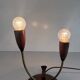 Simple double-headed table lamp in wood and brass, 1960s, Germany.