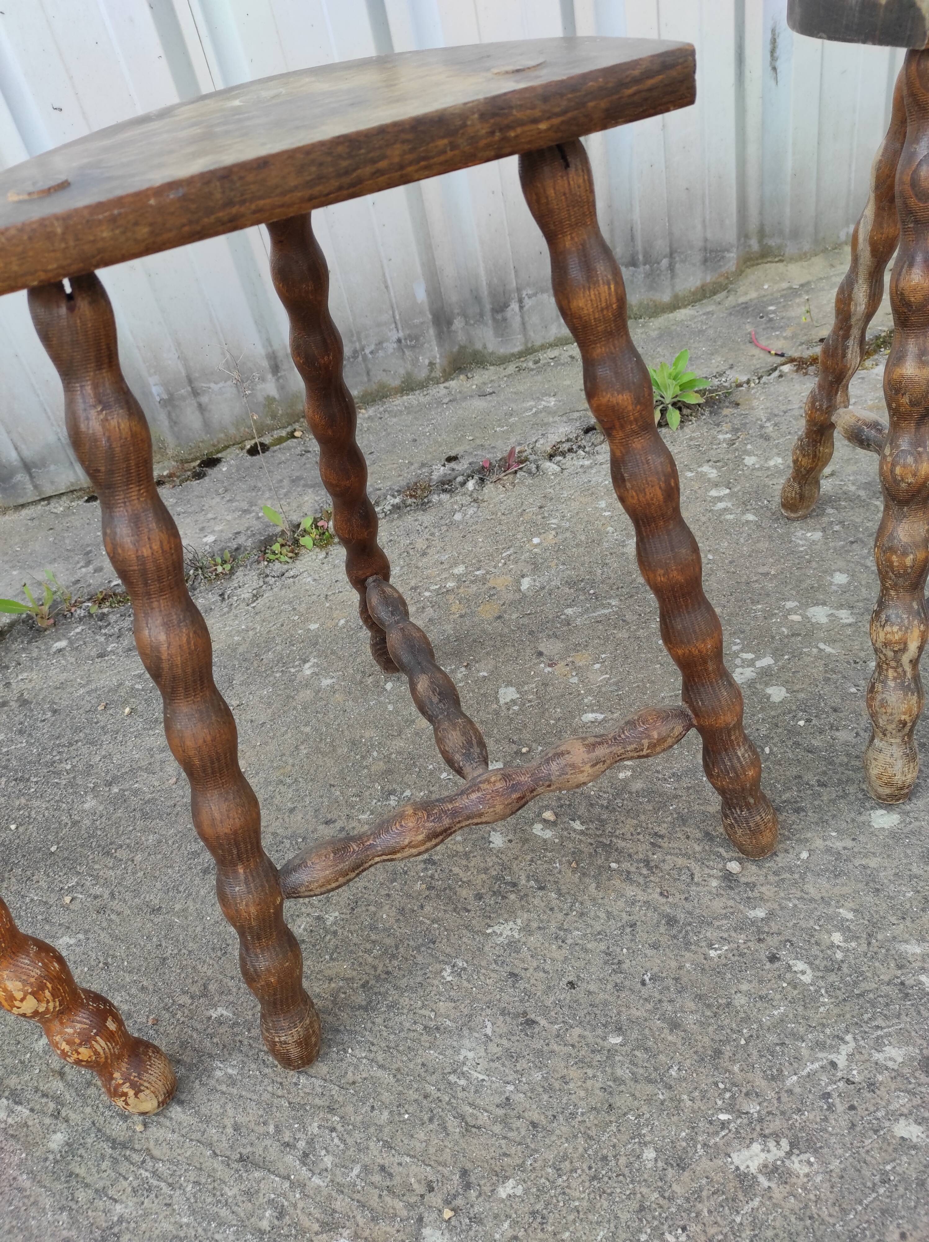 Lot 4 twisted wood tripod stools