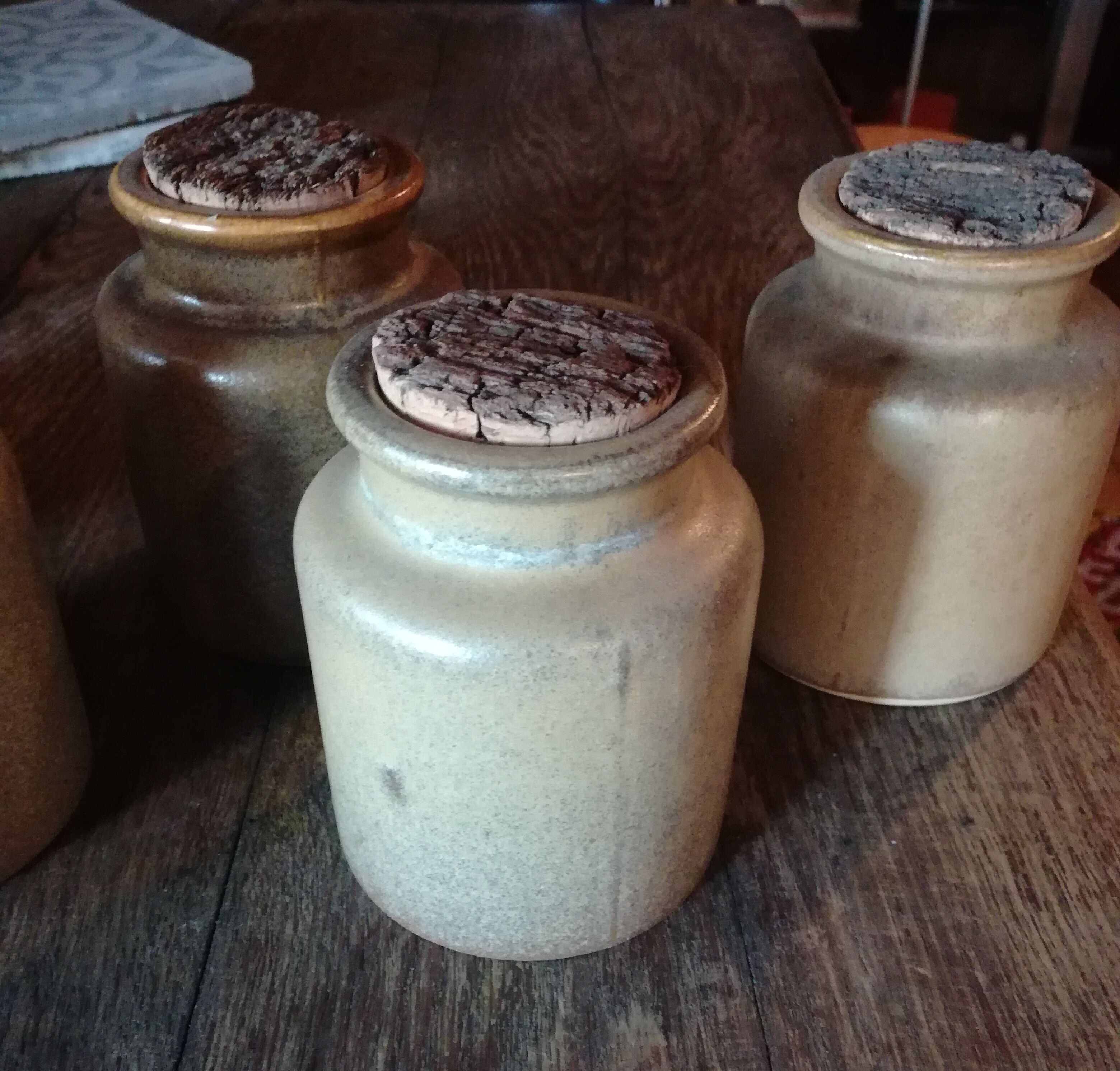 Lot of seven sandstone spice pots