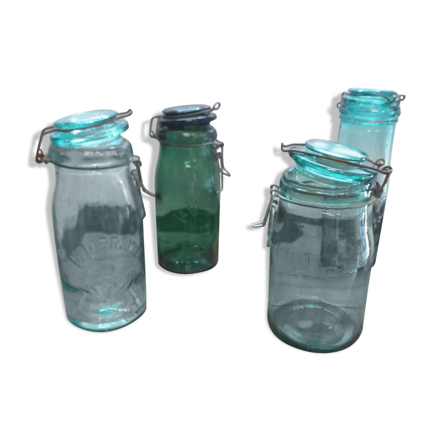 Old jar La Lorraine and The ideal in thick glass light green and dark green