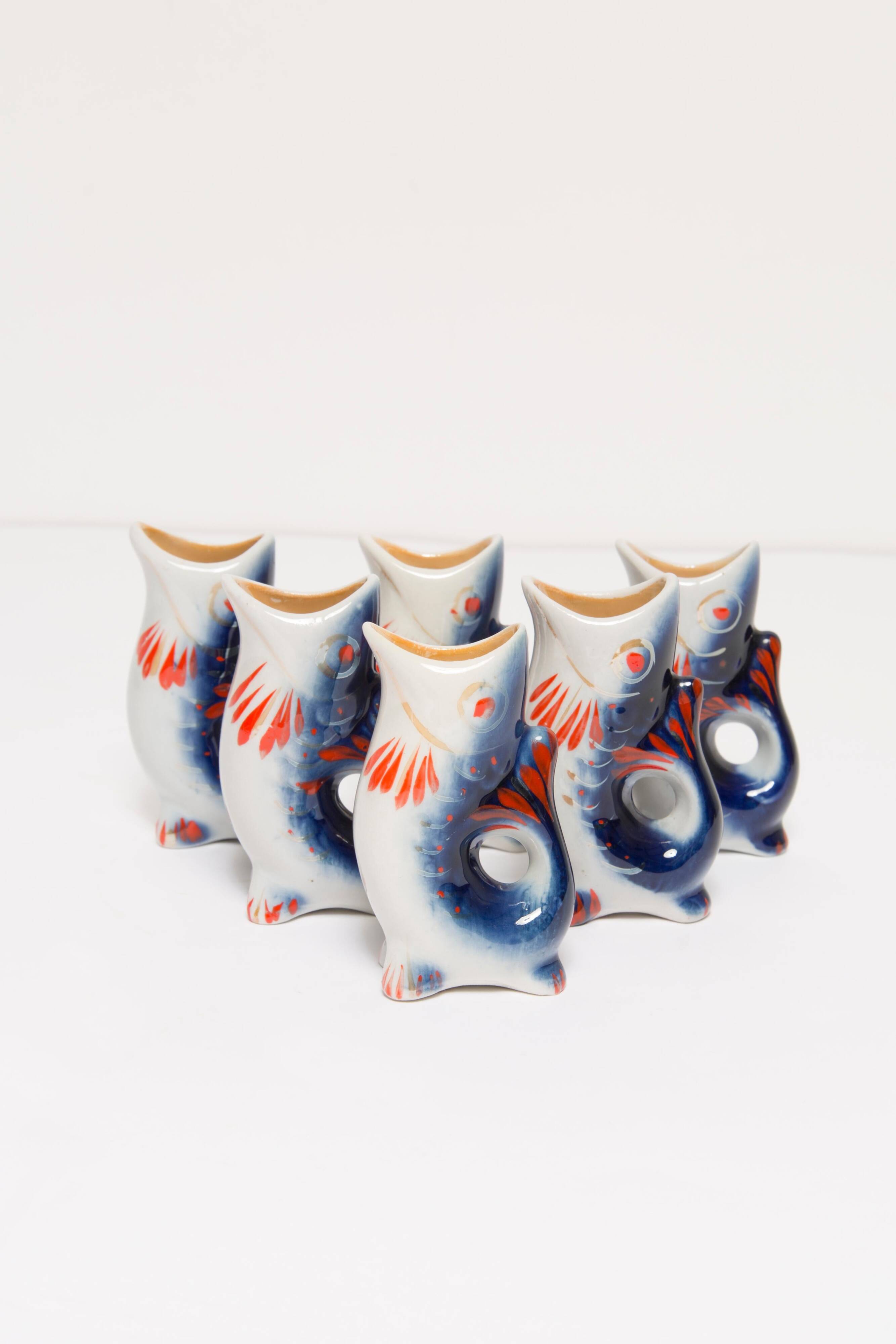 Set of 7 blue glass fish, mid-20th century.