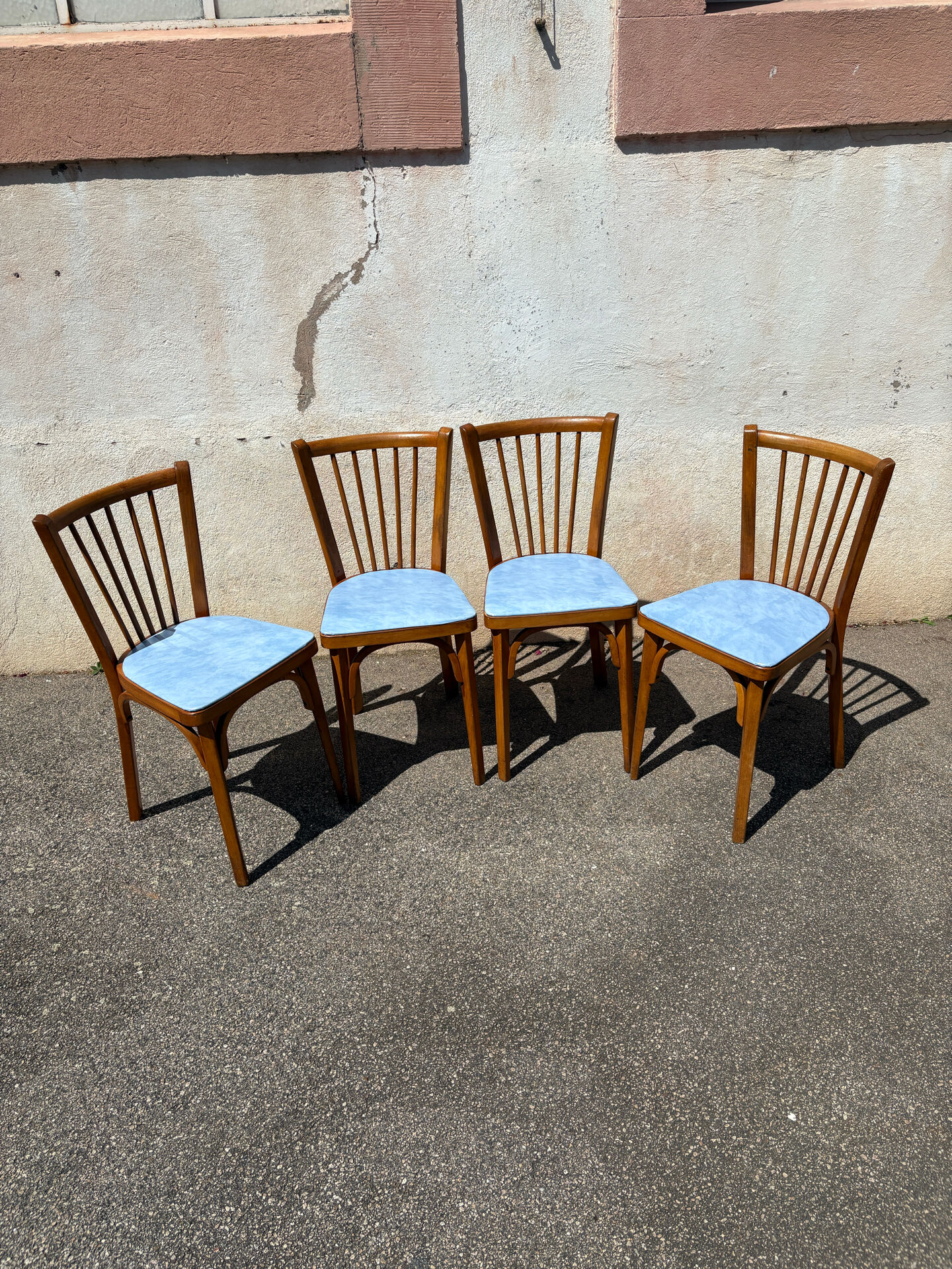 4 blue Baumann bistro chairs