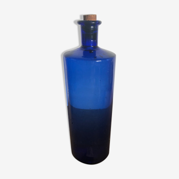 Blue bottle with cork stopper