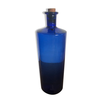 Bouteille bleue avec son bouchon en liège